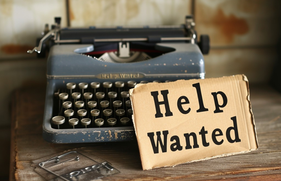Vintage Hiring Call A classic blue typewriter and a 'Help Wanted' sign symbolize the timeless search for assistance.