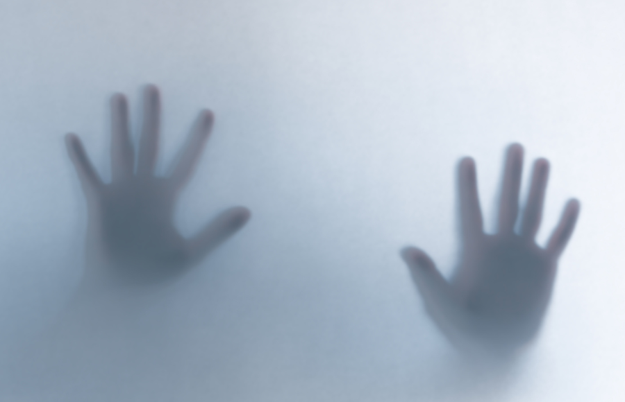 Hands, palms on a frosty plate - ghost-like