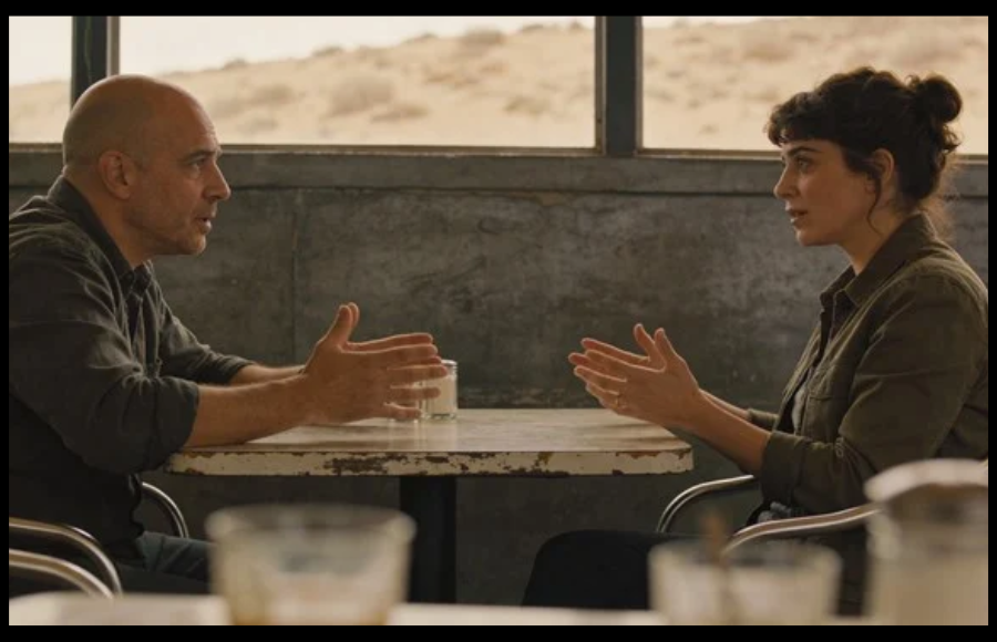 Couple having a conversation at a table